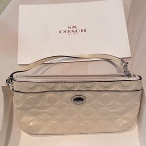 Coach clutch off white color